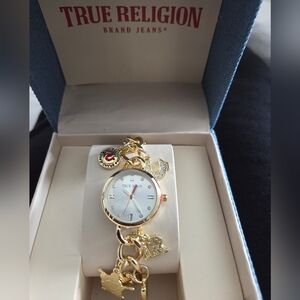 True Religion Gold Charm Bracelet Watch with White Dial